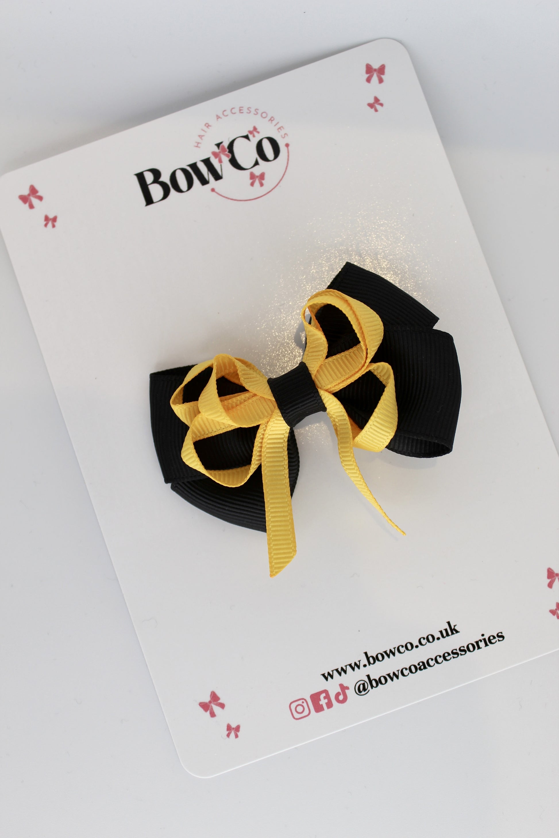 2.5 Inch Double Bow Clip - Black and Yellow Gold