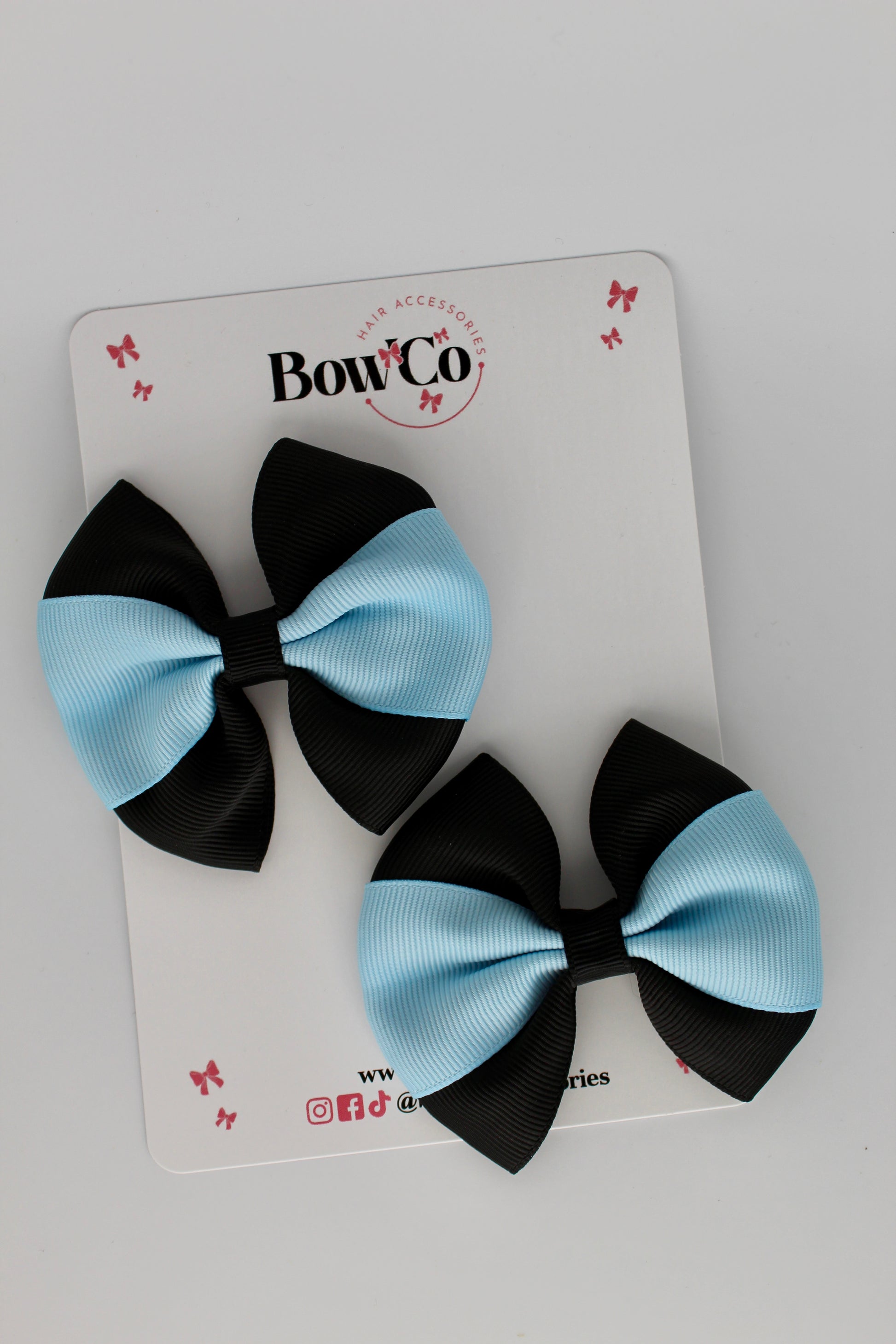 Black and Blue Topaz Round Tuxedo Bow